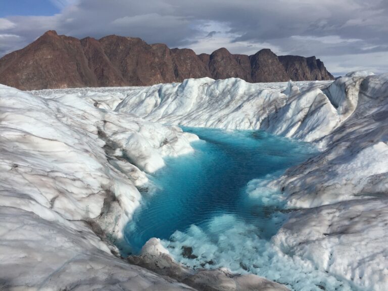 Water-filled crevasse at Bowdoin Glacier, Greenland (Photo by Evgeny Podolskiy, 2019)
