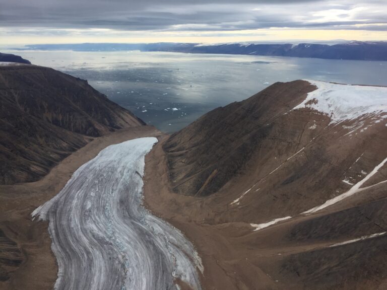 A retreating glacier no longer reaching the sea, Northwest Greenland (Photo by Evgeny Podolskiy, 2019)