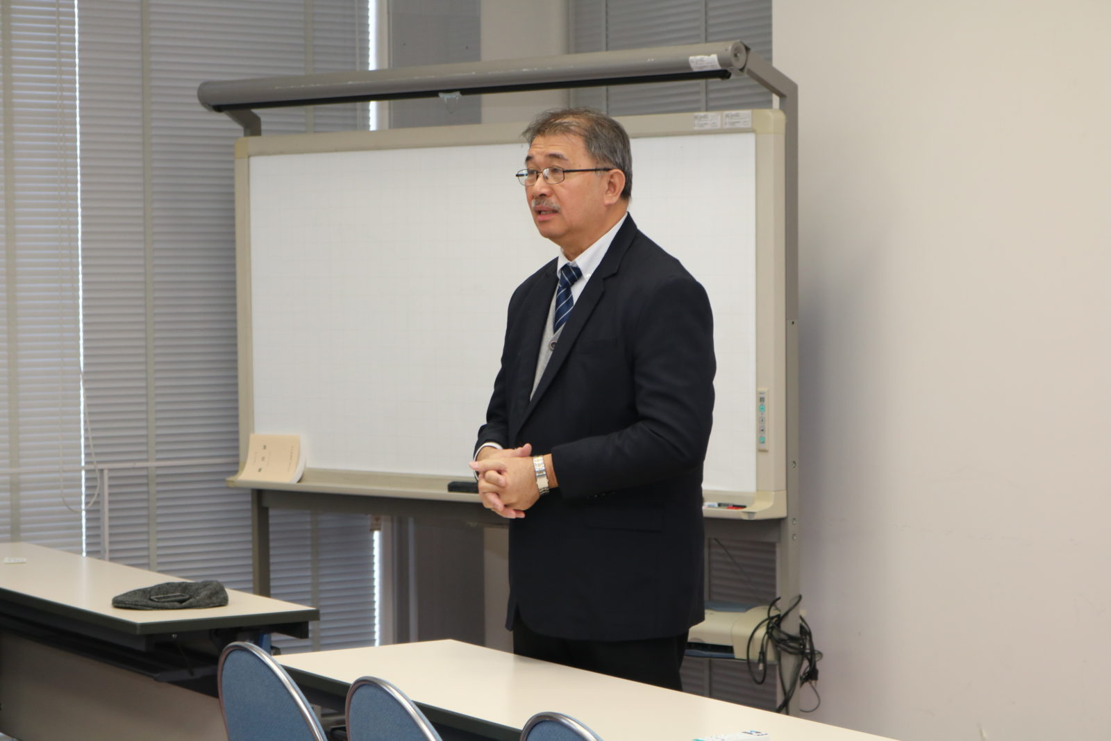 Secretary Fortunato T. De La Peña giving the opening address for the informal meeting at the Space Mission Center (Creative Research Institution).