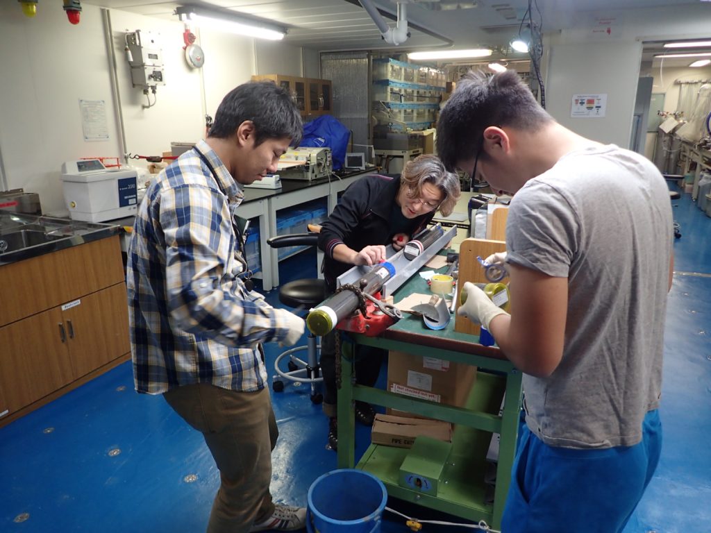 Working on a deep sea sediment core in Chikyu, a drilling vessel