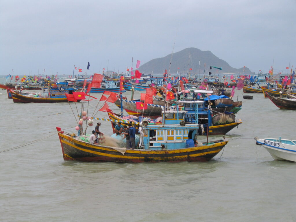 A photo of fishing boats in the Mekong River Delta, taken by Chuan-Chou Shen.