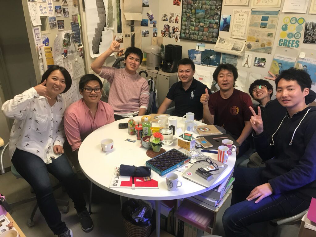 A photo of seven individuals, all members of the Coral Reef Environmental Earth Sciences Laboratory.