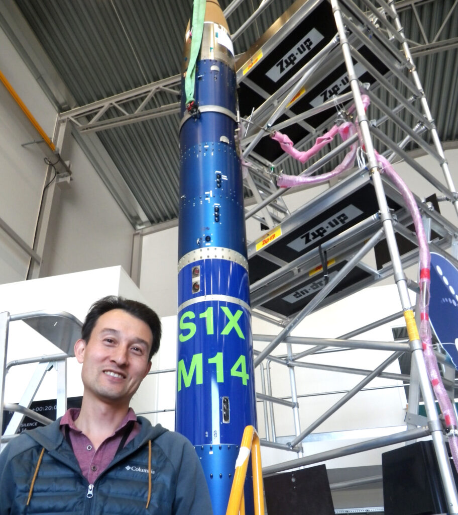 Yuki Kimura with the rocket used for microgravity experiments in the study. Photo by Yuki Kimura.